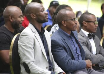 Mi Vida Homes CEO Sam Kariuki (middle) and other guests follow proceedings during KEZA investor forum