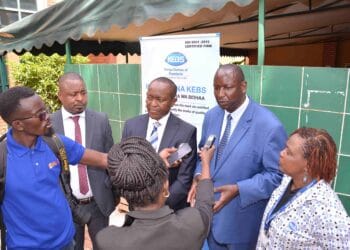 Kenya Bureau of Standards (KEBS) Director for Quality Assurance and Inspection Dr. Geoffrey Muriira (left), the National Standards Council Chairman Anthony Munyiri (centre) and KEBS Director for Metrology and Testing Dr. Henry Rotich (right) address the media during World Metrology Day celebrations at Boma Hotel.