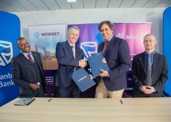 Kimani Njagi, Head of Vehicle and Asset Finance Stanbic Bank Kenya; Eugene Ochse, Executive Head of the Africa Regions Group Vehicle and Asset Finance Division, Standard Bank; Ricardo Teixeira, CEO of Mobikey East Africa; Antonio Matos, Chief Finance Officer Mobikey East Africa, during the signing of Memorandum of Understanding
