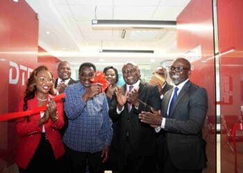 H.E James Orengo, Governor of Siaya County, leads the Diamond Trust Bank (DTB) executive team in the ribbon-cutting ceremony for the official launch of the DTB Bondo branch in Bondo, Siaya County. The DTB team was represented by George Otiende, Director of Retail Banking; Dr. Kennedy Nyakomitta, Director of Commercial Banking and Lillian Ngala, Director of Human Resources.