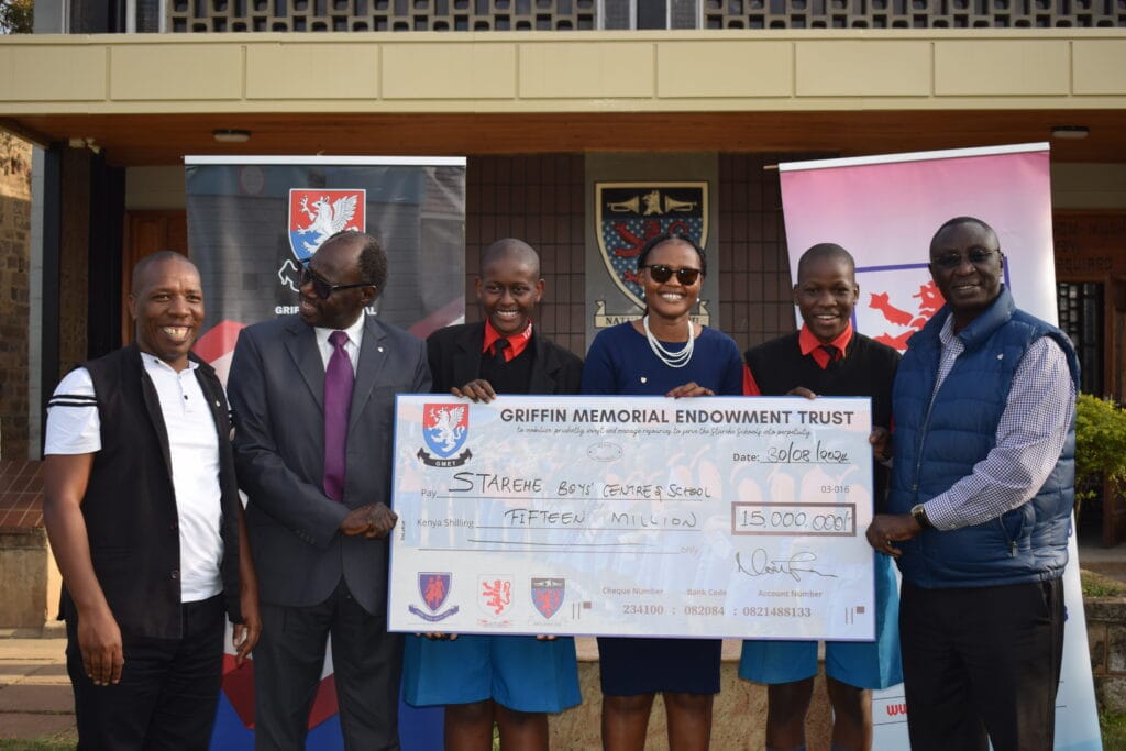 he Griffin Memorial Endowment Trust (GMET) Trustees led by Chairman Noah Meely (Right) Treasurer David Wachira (far left) and Secretary Vivian Onano present a cheque for KES 15M to Starehe Boys' Centre that was received by the Director Mr. Fred Okono (second left)