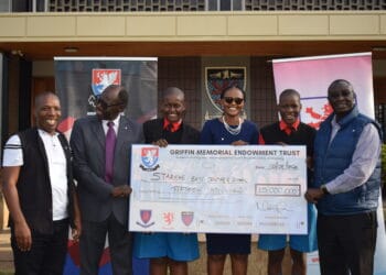 he Griffin Memorial Endowment Trust (GMET) Trustees led by Chairman Noah Meely (Right) Treasurer David Wachira (far left) and Secretary Vivian Onano present a cheque for KES 15M to Starehe Boys' Centre that was received by the Director Mr. Fred Okono (second left)