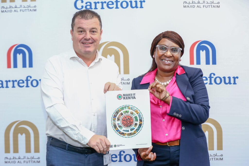 From left- Christophe Orcet, Regional Director - East Africa, Majid Al Futtaim Retail and Ms. Floice Mukabana, Chief Executive Officer - Kenya Export Promotion and Branding Agency shakes hands during a Courtesy meeting at Carrefour offices at Two Rivers earlier today following Majid Al Futtaim recognition as an Adoptee of 'Made in Kenya' Brand by KEPROBA.
