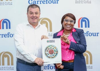 From left- Christophe Orcet, Regional Director - East Africa, Majid Al Futtaim Retail and Ms. Floice Mukabana, Chief Executive Officer - Kenya Export Promotion and Branding Agency shakes hands during a Courtesy meeting at Carrefour offices at Two Rivers earlier today following Majid Al Futtaim recognition as an Adoptee of 'Made in Kenya' Brand by KEPROBA.