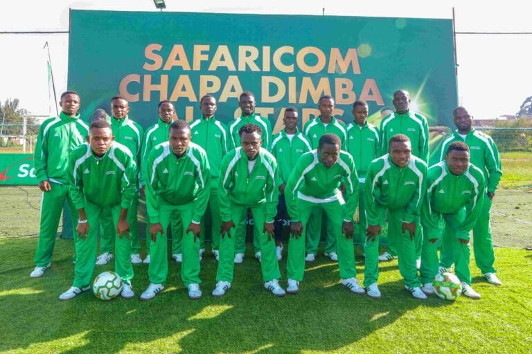 Zizwe Awuor, Director of Brand and Marketing, Safaricom PLC assisted by Patrick Korir unveiling the Safaricom Chapa Dimba, ALL STAR Team traveling to spain to undergo training and life skill coaching at SC HUESCA to represent team SafaricomChapa Dimba