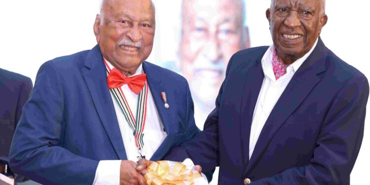 Author of Across Oceans, Across Generations, John Gomes, with renowned businessman and entrepreneur Peter Munga—one of his former students—at the launch of his book. Munga paid heartfelt tribute to Gomes’s enduring influence as a teacher and mentor, highlighting the values of self-worth, discipline, and courage that shaped both careers and character beyond the classroom.