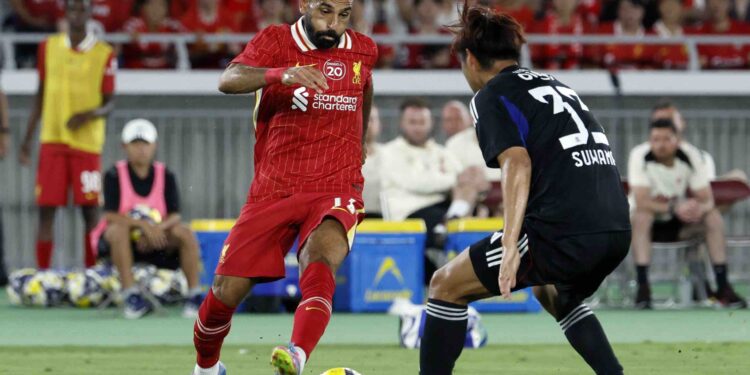 Liverpool FC Mohamed Salah (L) in action during a pre-season friendly soccer match between Liverpool FC and Yokohama F. Marinos, in Yokohama, near Tokyo, Japan, 30 July 2025. Liverpool FC won the match 3-1. EPA/FRANCK ROBICHON
