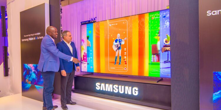 L-R: Sam Odhiambo, Head of Consumer Electronics Business Kenya, with Rahul Kochhar, Business Head, Consumer Electronics Division, Samsung Electronics East Africa, reviewing the newly launched 2025 Samsung NEO QLED 100-inch AI TV in Nairobi, Kenya, on Thursday. The cutting-edge Samsung AI TV sets a new benchmark in large-screen home entertainment.