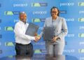 KCB Bank Kenya Managing Director, Annastacia Kimtai, and Pesapal Founder, Agosta Liko, during the signing of a strategic partnership between KCB Bank Kenya and Pesapal Limited.