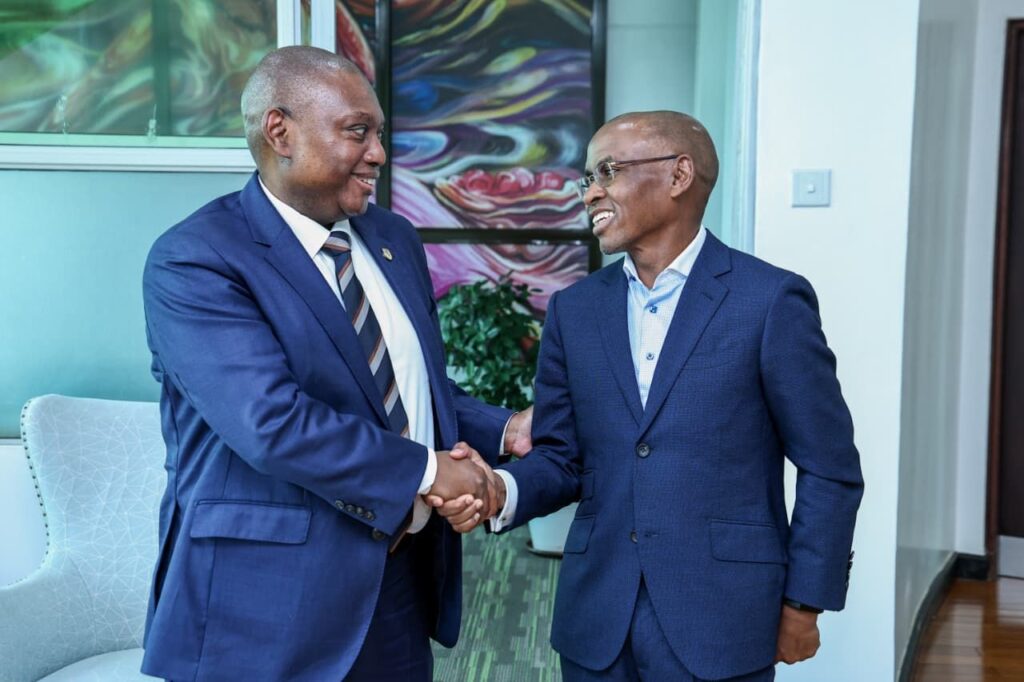 Standard Bank Group Chief Executive Sim Tshabalala with Safaricom CEO Peter Ndegwa