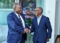 Standard Bank Group Chief Executive Sim Tshabalala with Safaricom CEO Peter Ndegwa