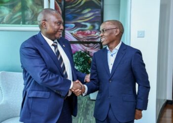 Standard Bank Group Chief Executive Sim Tshabalala with Safaricom CEO Peter Ndegwa