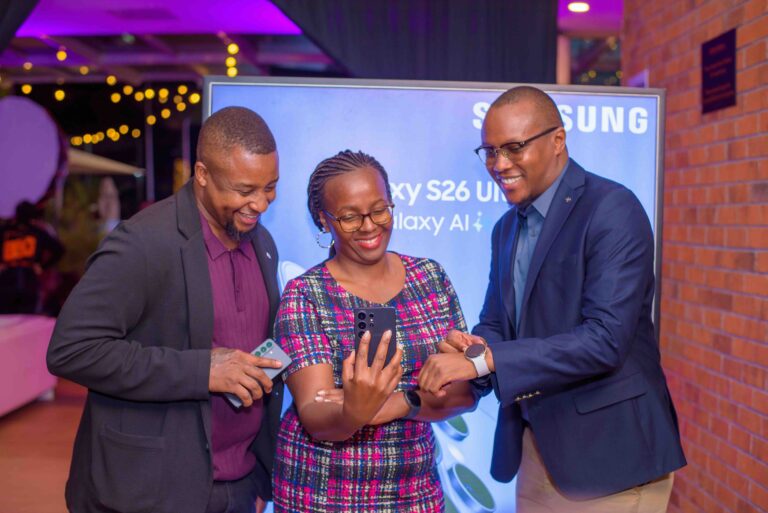 (L-R) Ryan Mule, Product Marketing Manager, Mobile Division Samsung Electronics East Africa, Evelyne Munene, Head of Product and Marketing, Mobile Division Samsung Electronics East Africa and George Kebaso Head of EIP Business Samsung Electronics sharing a light moment with the Galaxy S26 Series during the official launch