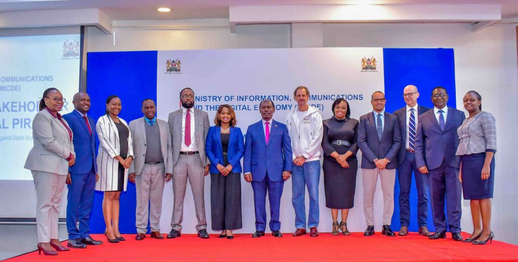 H.E. Hon. William Kabogo, Cabinet Secretary for the Ministry of Information, Communications & the Digital Economy (Centre), pose for a group photo with stakeholders from government, industry, and civil society during the National Multi-stakeholder Forum on Digital Piracy in Nairobi.