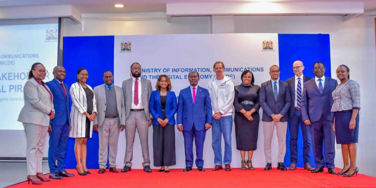 H.E. Hon. William Kabogo, Cabinet Secretary for the Ministry of Information, Communications & the Digital Economy (Centre), pose for a group photo with stakeholders from government, industry, and civil society during the National Multi-stakeholder Forum on Digital Piracy in Nairobi.
