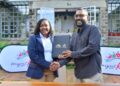 Kenya Tourism Board (KTB) CEO June Chepkemei (L) and EatOut Africa Director Mikul Shah ratify a joint initiative to market Kenya's culinary tourism sector through tech-driven visitor experiences at The Lake House Tigoni