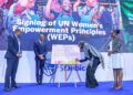 UN Women Country Representative to Kenya, Ms. Antonia N'gabala Sodonon (Second Right) signing the seven UN Women's Empowerment Principles (WEPs). Looking on is Regional Chief Executive, East Africa, Standard Bank, Dr. Joshua Oigara (Second Left), Acting Chief Executive, Stanbic Bank Kenya & South Sudan (Far Left) and Participant Engagement Manager, Global Compact Network Kenya, Mary Waweru (Far Right)