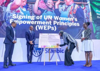 UN Women Country Representative to Kenya, Ms. Antonia N'gabala Sodonon (Second Right) signing the seven UN Women's Empowerment Principles (WEPs). Looking on is Regional Chief Executive, East Africa, Standard Bank, Dr. Joshua Oigara (Second Left), Acting Chief Executive, Stanbic Bank Kenya & South Sudan (Far Left) and Participant Engagement Manager, Global Compact Network Kenya, Mary Waweru (Far Right)