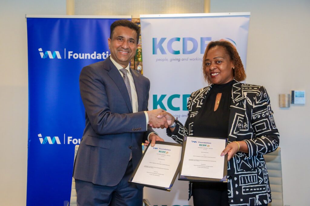 Mr. Sarit Shah, Group Executive Director, I&M Group and Mrs. Rose Mambo, Board Chair, KCDF sign the official agreement to formalize a KES 64.8 million partnership to advance Green & Digital transformation in Kenya