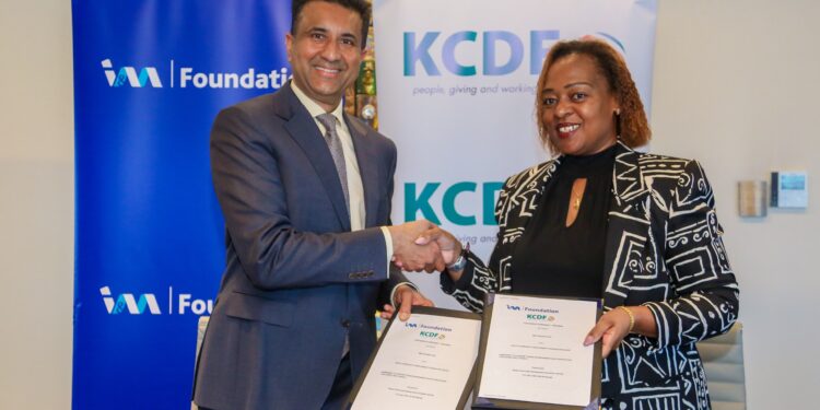 Mr. Sarit Shah, Group Executive Director, I&M Group and Mrs. Rose Mambo, Board Chair, KCDF sign the official agreement to formalize a KES 64.8 million partnership to advance Green & Digital transformation in Kenya
