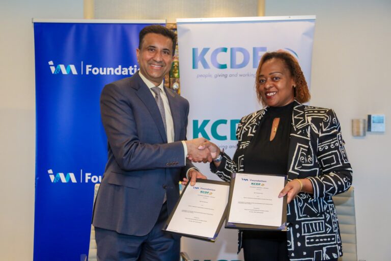 Mr. Sarit Shah, Group Executive Director, I&M Group and Mrs. Rose Mambo, Board Chair, KCDF sign the official agreement to formalize a KES 64.8 million partnership to advance Green & Digital transformation in Kenya