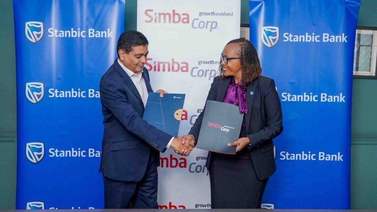 Stanbic bank Kenya’s Regional Executive Head Business & Commercial banking, Florence Wanja signs and exchanging signed documents with Simba Corporation Group CEO, Dinesh Kotecha, during the signing of a Memorandum of Understanding (MOU) at their head office in Nairobi. Simba Corp owns and operates Associated Vehicle Assemblers Limited, one of East Africa’s largest vehicle assembly plants. AVA assembles trucks, pickups, buses, and passenger vehicles for several global brands.