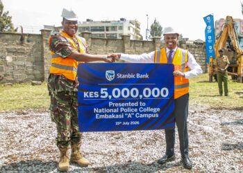 Acting Chief Executive and Head of Personal and Private Banking, Stanbic Bank Kenya and South Sudan, Abraham Ongenge (R) with The Deputy Inspector General (DIG), Head of Administration Police Service, Gilbert Masengeli (L), during the ground breaking ceremony for the construction of a guard house at the facility.