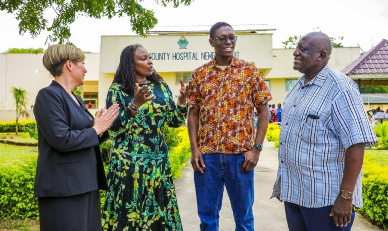 Dr. Shannon Shibata Germanos, Head of Global Health at Proximie, Patricia Ithau,M-PESA Foundation Trustee, Dr. Michael Mwachiro, President of the Surgical Society of Kenya and Peter Mwarogo, Kilifi County Executive Committee Member for Health and Sanitation Services during the Digital Operating Room launch at Kilifi County Referral Hospital.