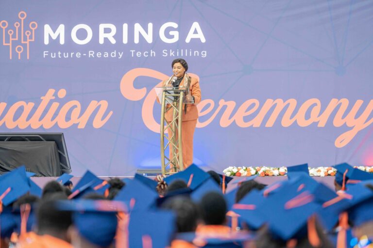 Mary Kerema, OGW, Secretary for ICT, E-Government and the Digital Economy, addressing graduates during the Moringa School 2026 Graduation and Career Fair in Nairobi. A total of 1,761 learners graduated across Data Science, Artificial Intelligence, Cybersecurity, Data Analytics, Software Engineering, DevOps, Product Design and Data Visualisation.