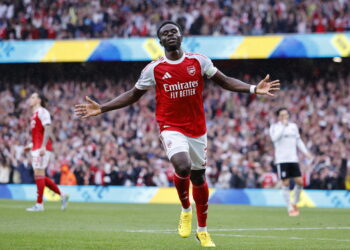 epa12928466 Bukayo Saka of Arsenal celebrates scoring the 2-0 goal during the English Premier League match Arsenal FC against Fulham FC, in London, Britain, 02 May 2026. EPA/TOLGA AKMEN EDITORIAL USE ONLY. No use with unauthorized audio, video, data, fixture lists, club/league logos, 'live' services or NFTs. Online in-match use limited to 120 images, no video emulation. No use in betting, games or single club/league/player publications.