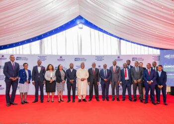 Transaction advisory team lead by Renassance Capital poses for a photo with Aliko Dangote